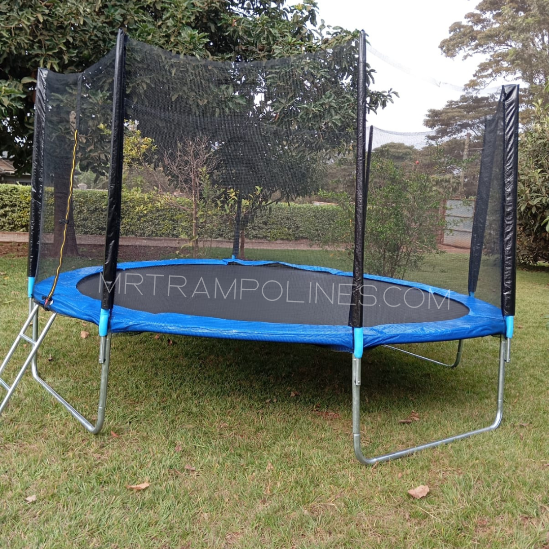 12ft trampoline delivery in Nairobi Kenya — Mr. Trampolines crew loading a trampoline onto a delivery vehicle