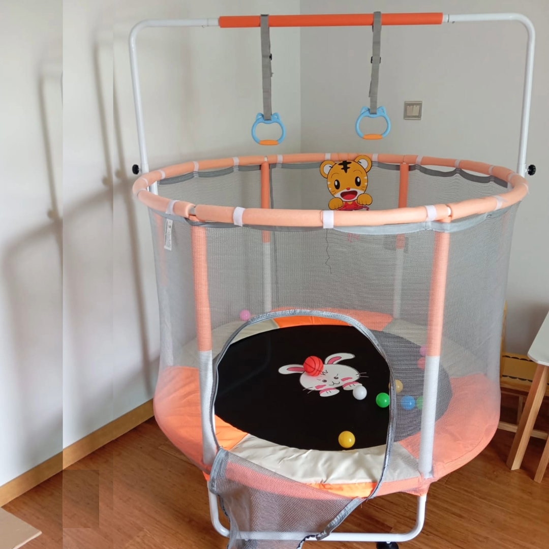 Premium kids trampoline with safety enclosure net set up in a Nairobi backyard